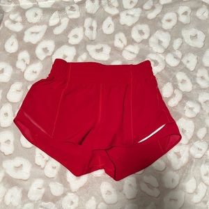 Lululemon high rise hotty hot shorts size 6 length 2.5 color dark red